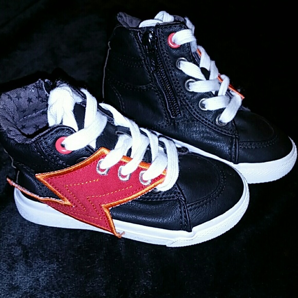 red shoes with lightning bolt